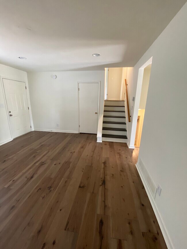 Head upstairs to 3 bedrooms and a full bathroom - 114 Woodglen Dr