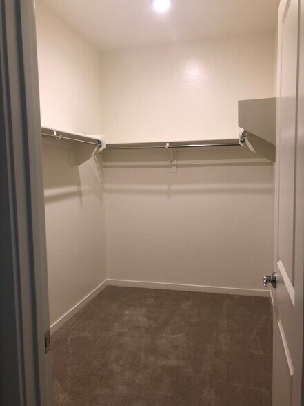 Master walk-in closet. - 21335 West Granada Road