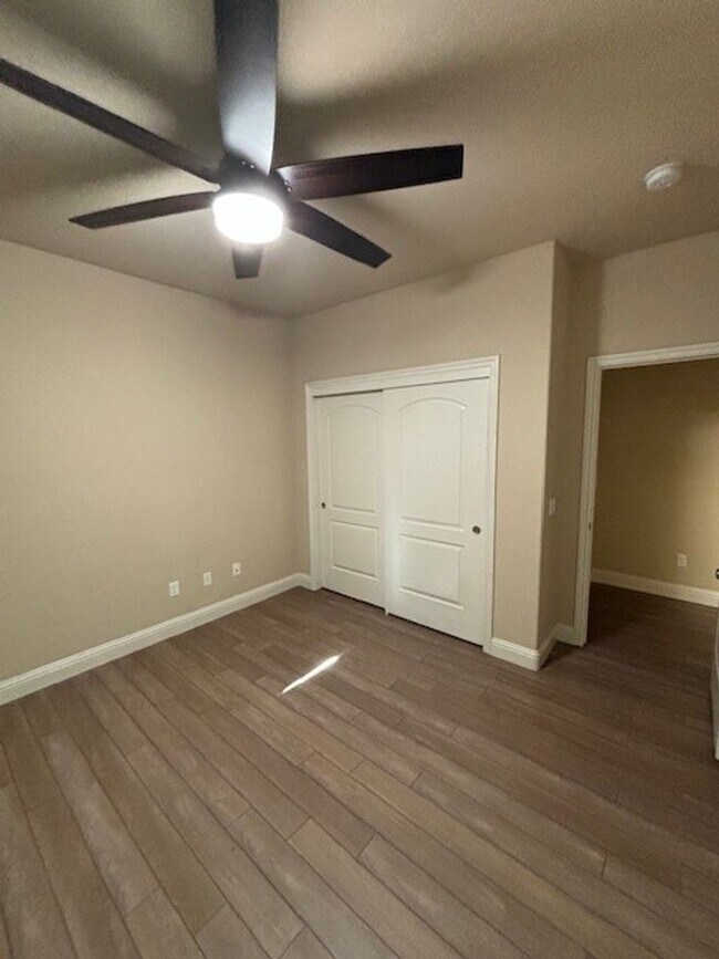 Building Photo - Elegant 4-Bedroom Home with Paid Solar in ...