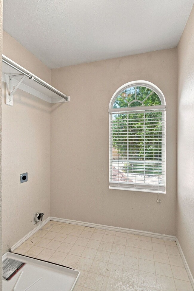 Building Photo - "Spacious Two-Story Home with Multiple Living Spaces and and Expansive Backyard!"