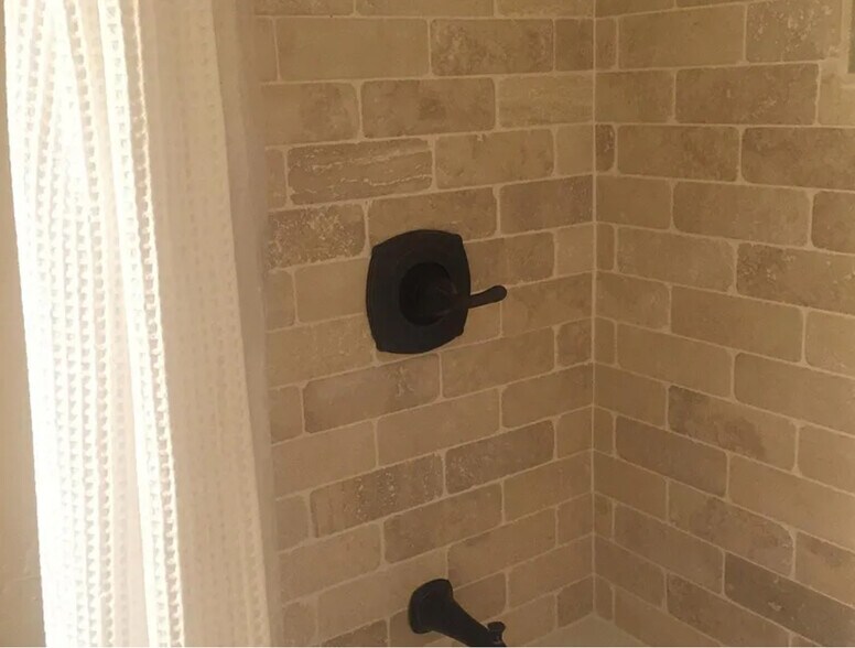 travertine tile - 7012 E Redfield Rd