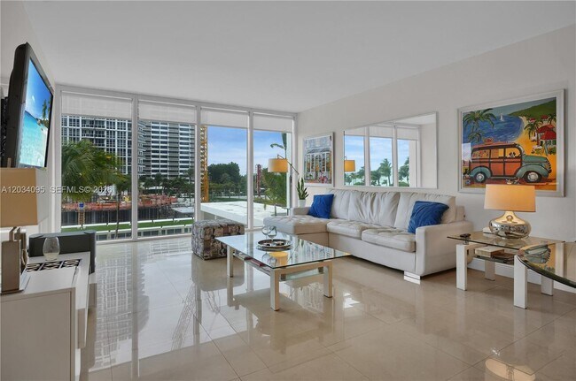 Building Photo - 10275 Collins Ave