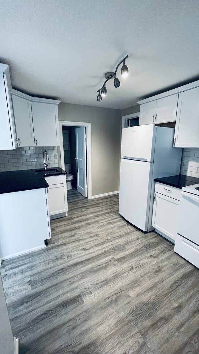 Building Photo - Charming Riverfront Rental in the Heart of...