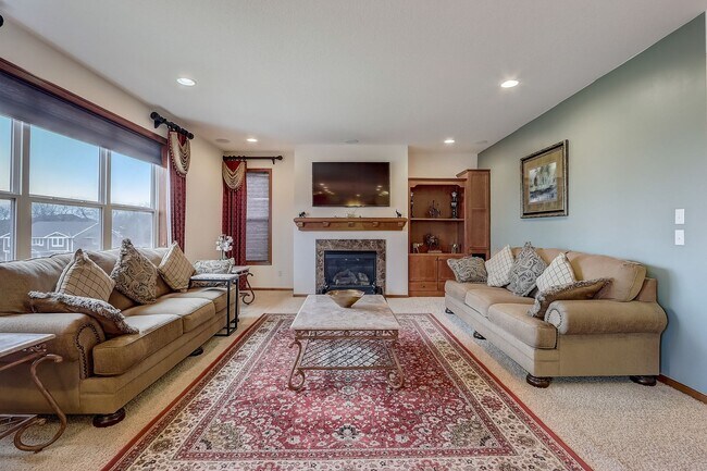 Building Photo - Grand 5 bed 4.5 bath Maple Grove Home w/ 3-Car Garage! Fully Furnished