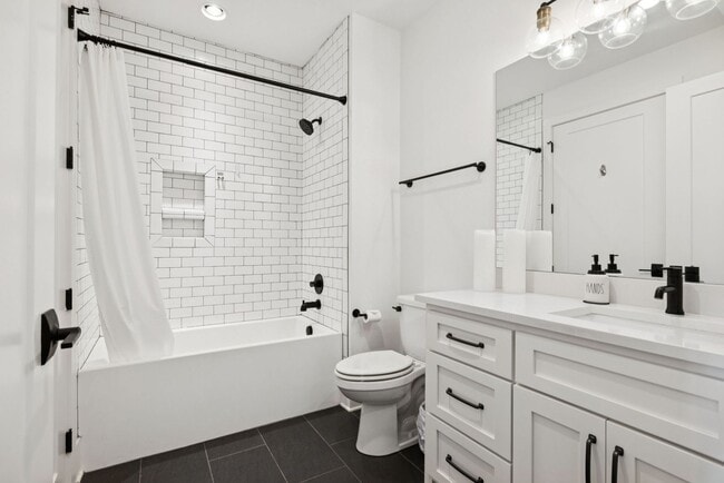 Building Photo - Experience elevated living in this beautifully crafted brick residence located in the heart of Ed...