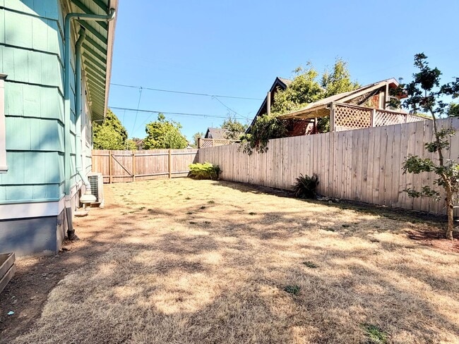Building Photo - 2 Weeks Free! Charming Craftsman with Solar Savings, Hardwood Floors, and Private Backyard - Move...