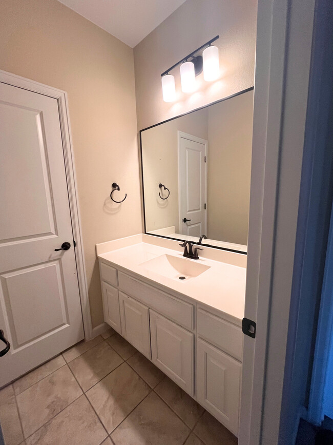 Vanity in Upstairs Bathroom - 5704 Alonso Dr