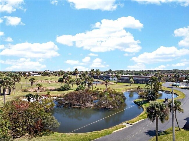 Building Photo - 1 N Ocean Palm Villas