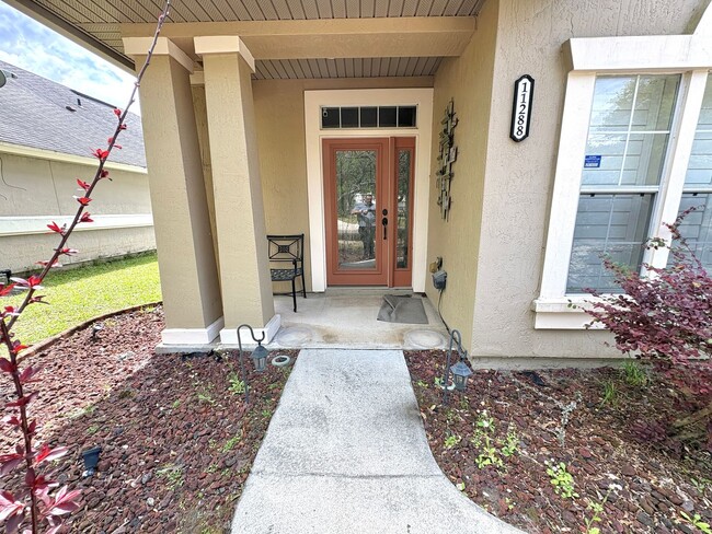 Building Photo - Spacious Two-Story Home with Hot Tub, Pool Table & Fenced Yard in Panther Creek
