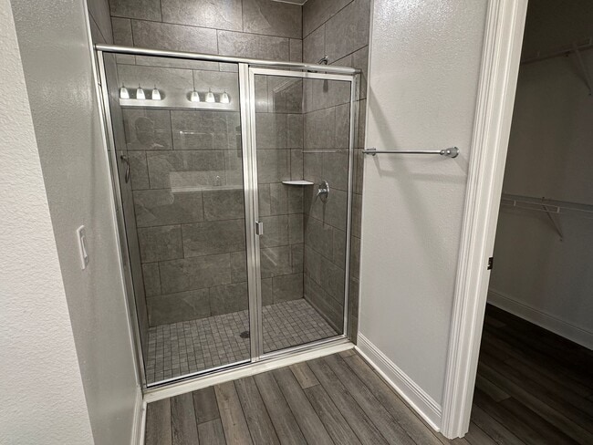 Building Photo - Nearly New 3 Bedroom Smart Home with Lawn Care Included!