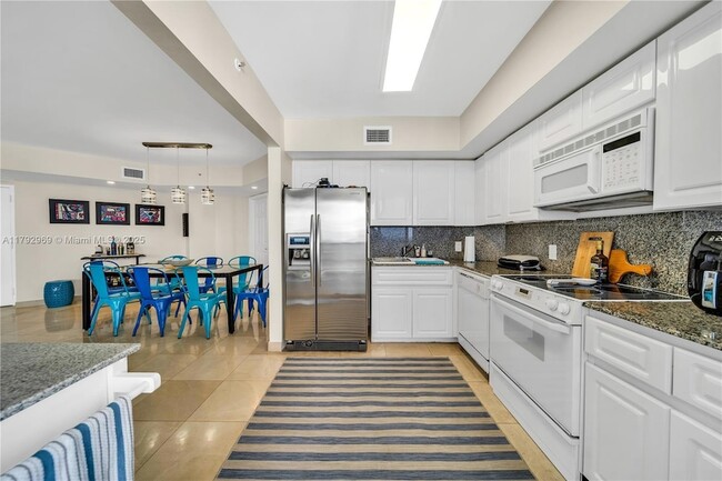 Building Photo - 6301 Collins Ave
