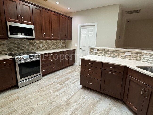 Building Photo - 7824 Sanderling Pl