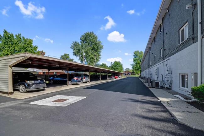 Building Photo - The Flats at Sycamore Creek