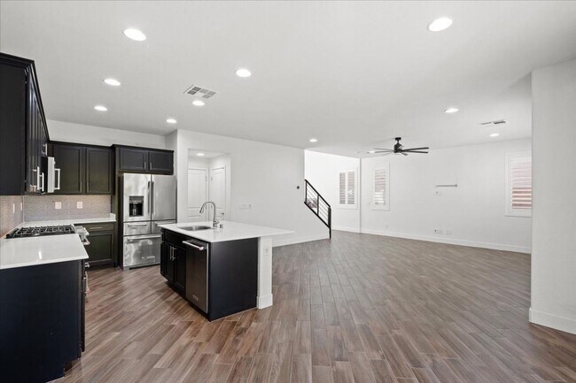 Building Photo - Modern Gated 3 Bedroom Retreat with Loft & Entertainer’s Backyard