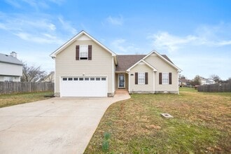 Building Photo - Pet Friendly Three Bedroom with Bonus!