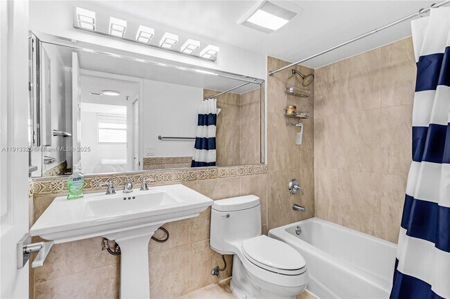 Building Photo - 5880 Collins Ave