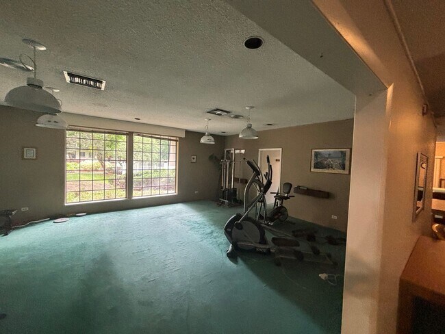 Building Photo - Jasmine Condos Updated 1 bd/1ba