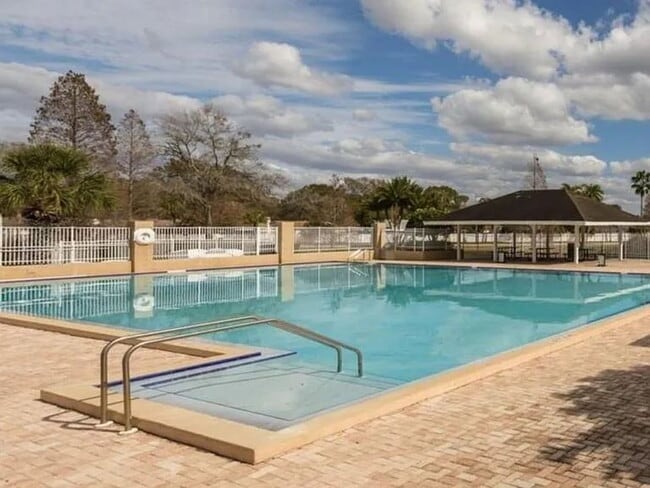 Building Photo - Spacious Townhome with Pond Views | 3BR + Loft + Screened Patio