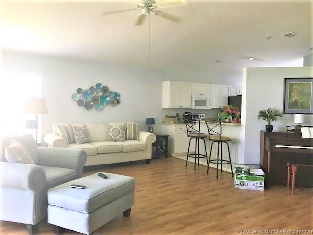 Building Photo - 3486 SW Pindo Palm Ln