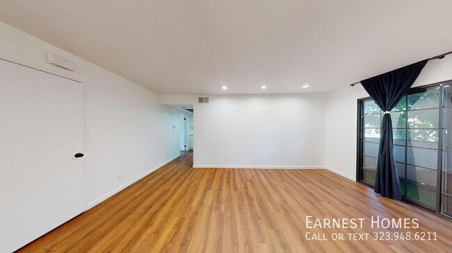 Building Photo - 10220 De Soto Ave