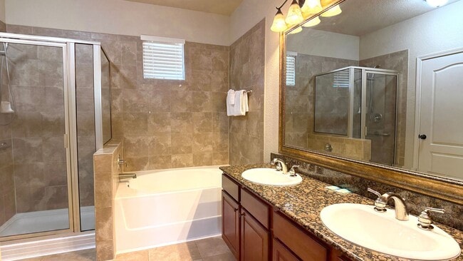 Building Photo - Move-in ready and Fully Furnished! This beautifully maintained 3-bedroom, 3-bath Condo offers a R...