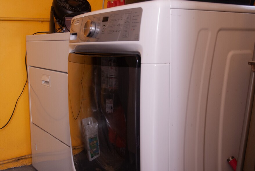 Shared laundry is just downstairs. - 936 Palms Blvd