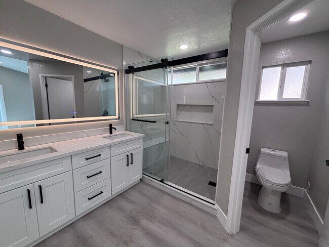 Building Photo - EVERGREEN- Newly Remodeled 3BR/2 BA Home with Spacious Backyard