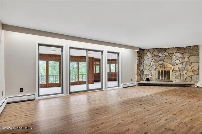 living room with fireplace - 82 Millers Corners Rd