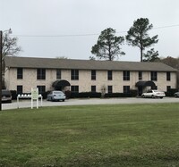 Building Photo - WoodCreek Apartments