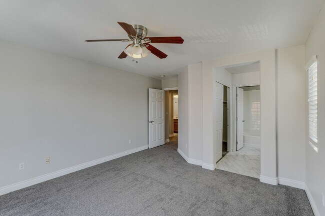 Building Photo - Gated Townhome with Strip Views from the Balcony!