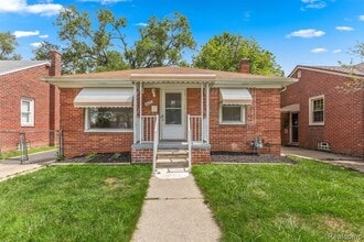 Building Photo - Cozy & Modern: 2-Bed Brick Home with Garage & Finished Basement