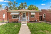 Building Photo - Cozy & Modern: 2-Bed Brick Home with Garage & Finished Basement