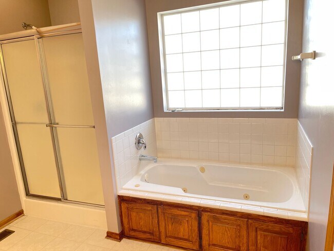 Building Photo - Northwest Omaha Gem: 2,700 Sq Ft, 3-Bedroom, Walk-Out Finished Basement, Fenced Yard, 3-Car Garag...