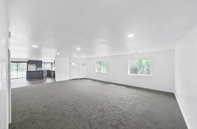Building Photo - Spacious 4-Bedroom Home with Stunning Hill...
