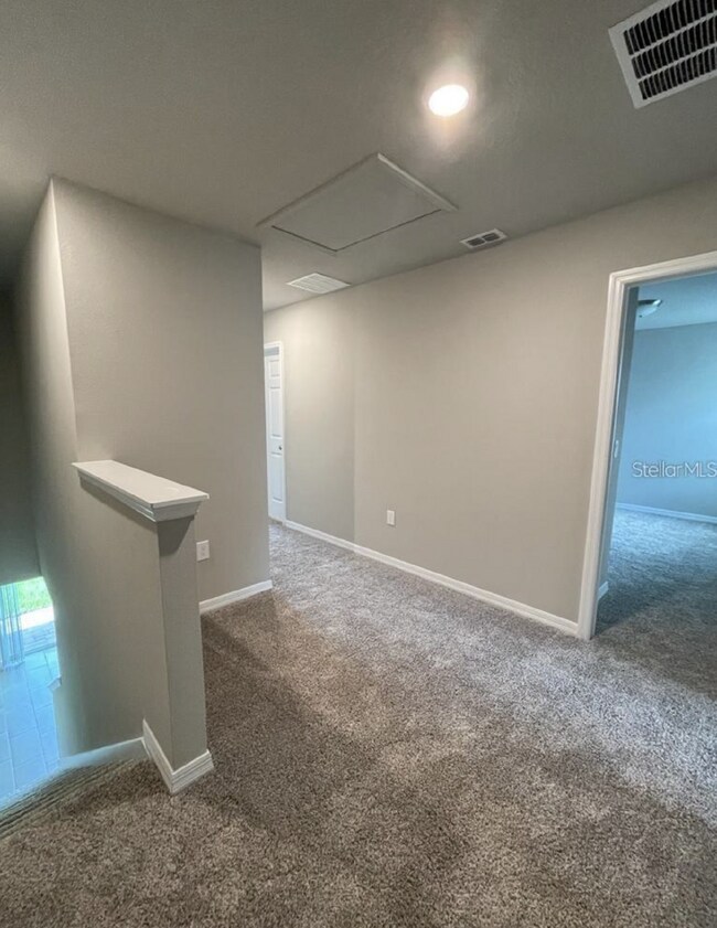 Building Photo - Beautiful corner unit townhouse features an abundance of natural light.