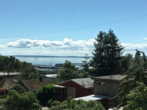 Building Photo - Industrial-Style Queen Anne Townhome with water views on every floor! AVAILABLE NOW!