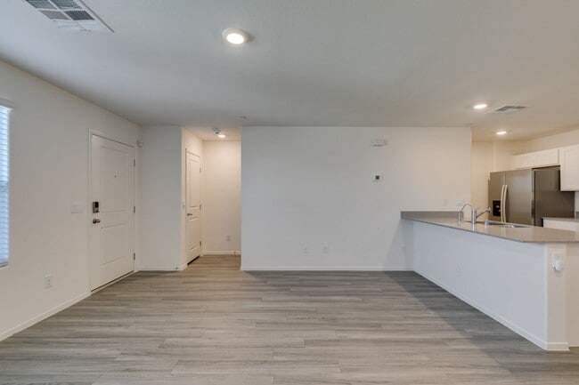 Building Photo - Gorgeous Townhome with upgrades in gated community* 3 large bedrooms, 2 car garage*Community pool...