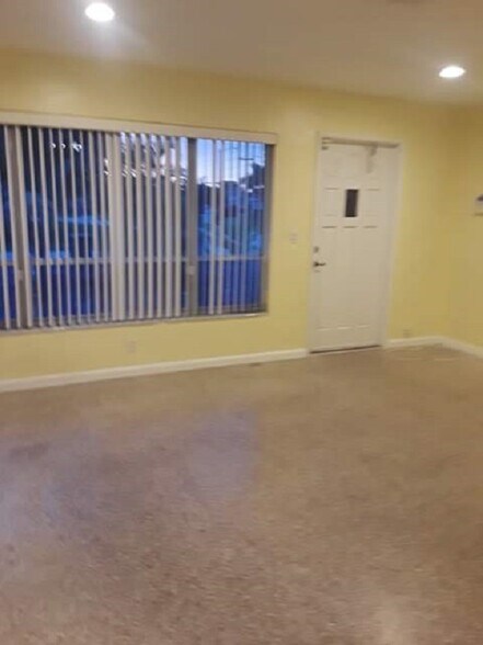Living Area Front Door and Front Window View - 4850 Southwest 41st Avenue