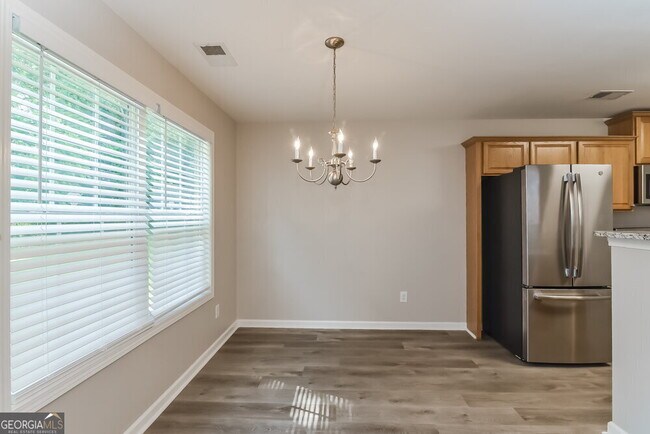 Building Photo - 6695 White Walnut Way