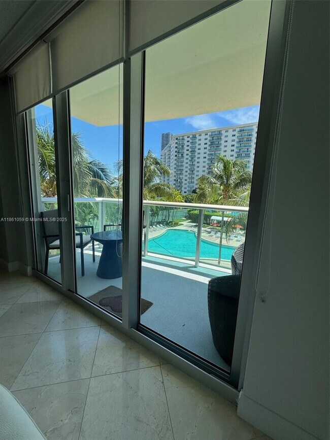 Building Photo - 19380 Collins Ave