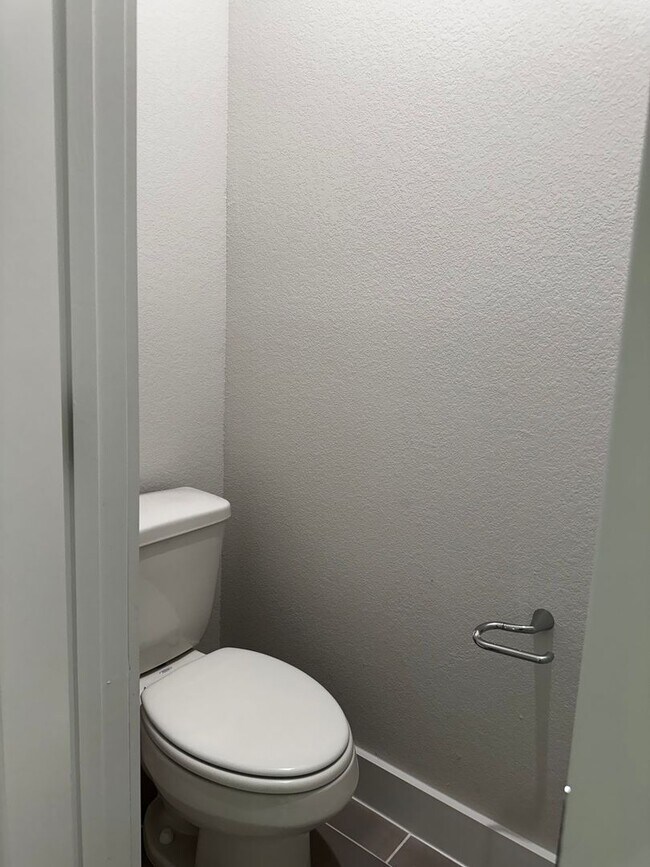 Building Photo - For Lease – Modern 2023 Condo Backing to Greenbelt | Creekside at Pioneer Crossing West