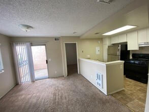 Building Photo - 2 BR 2 BA Corner Condo w/Balcony W/D Gated Entry Carport + Space
