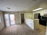 Building Photo - 2 BR 2 BA Corner Condo w/Balcony W/D Gated Entry Carport + Space