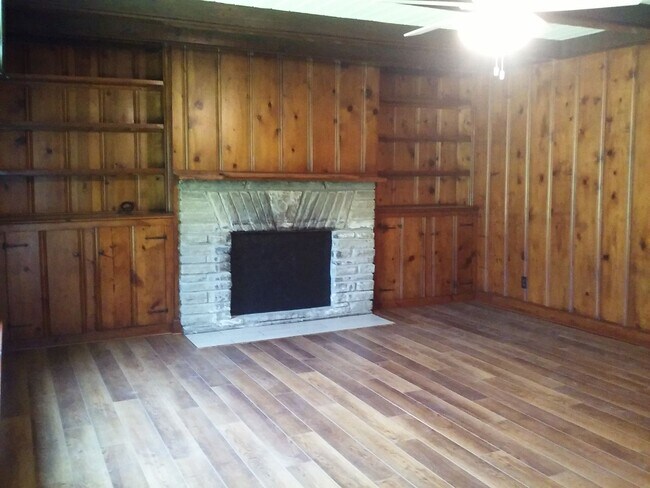 Building Photo - Cute log house in the woods off Charlotte Pike with EV charging!