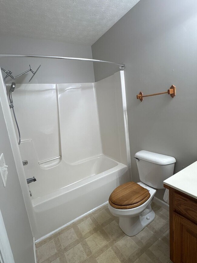 Building Photo - Charming Home with Covered Back Deck and Fenced in Yard...