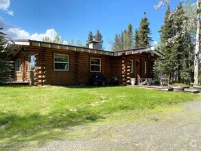 Building Photo - PRIVATE DUPLEX OVERLOOKING MOOSE RIVER