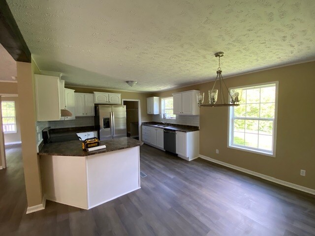 Kitchen with new stainless appliances - 1224 Montlake Rd