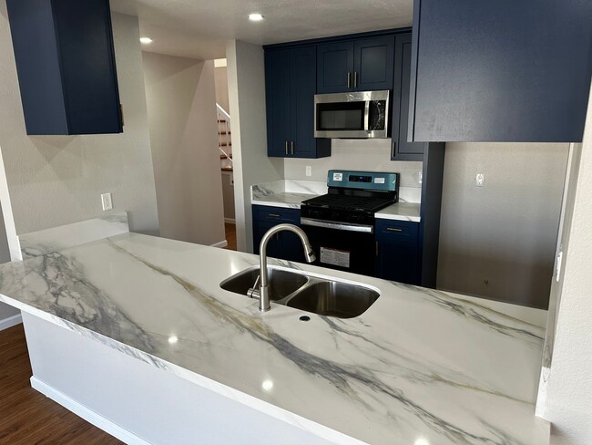 Building Photo - Beautifully Renovated 5-Bedroom Home with ...