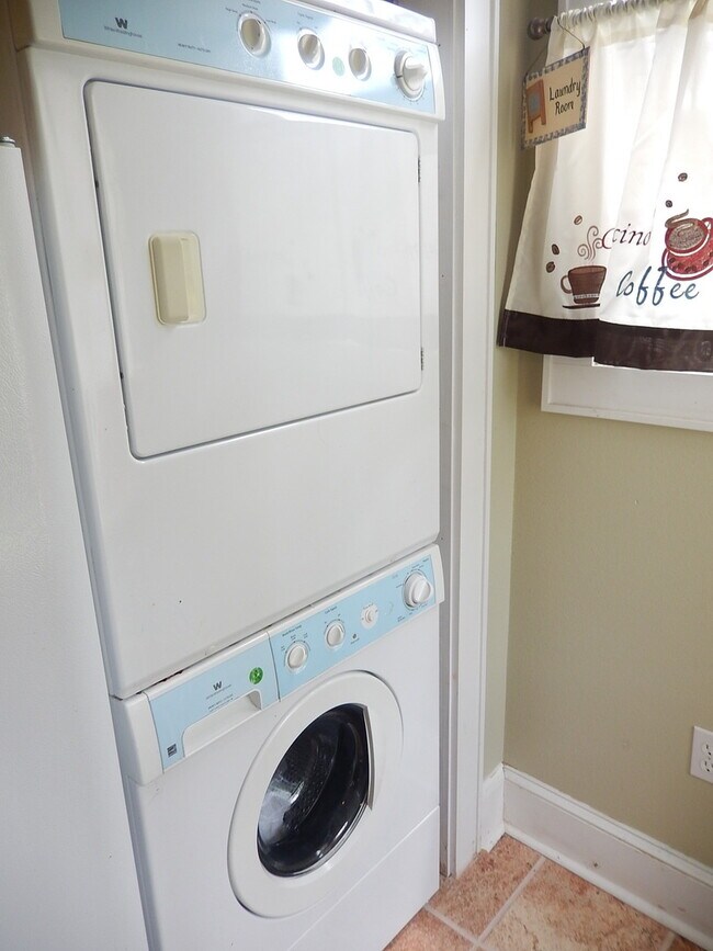 Building Photo - GLAMOROUS 3/2.5 w/ Pond View, Deck, Stainless Appliances, Wood Floors, Fireplace, & More! $2150/m...