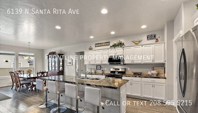 Building Photo - 6139 N Santa Rita Ave